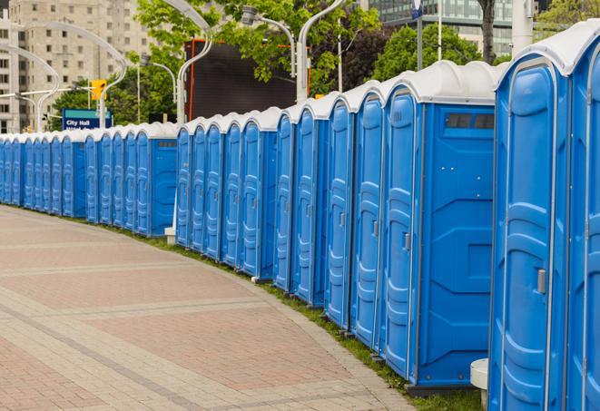 a row of portable restrooms at a fairground, offering visitors a clean and hassle-free experience in Perth Amboy, NJ